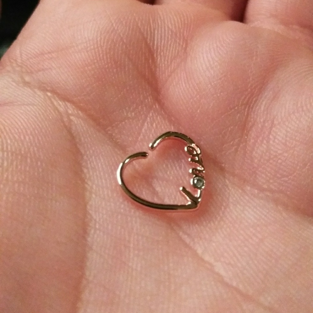 Daith and/or helix piercing.